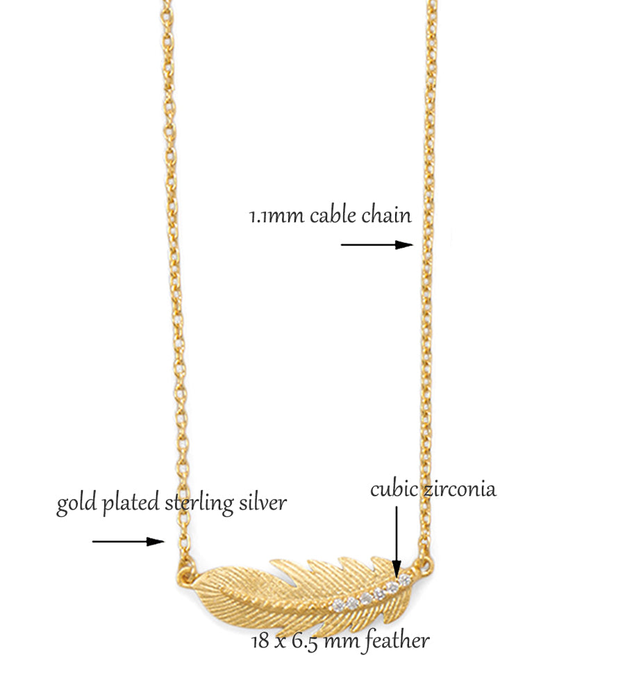 gold sideways feather necklace