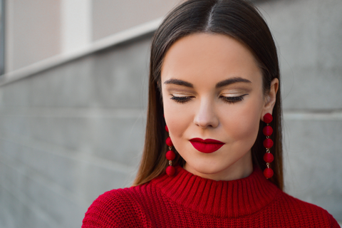 woman with red lips and dress