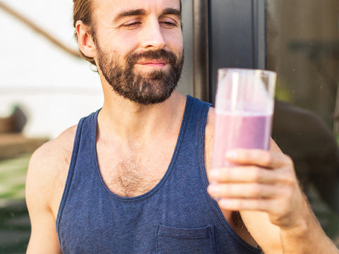 man drinking healthy shake