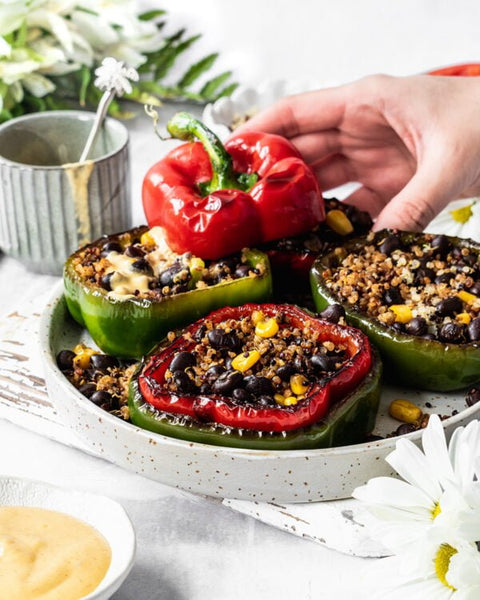 Grilled quinoa stuffed red and green peppers