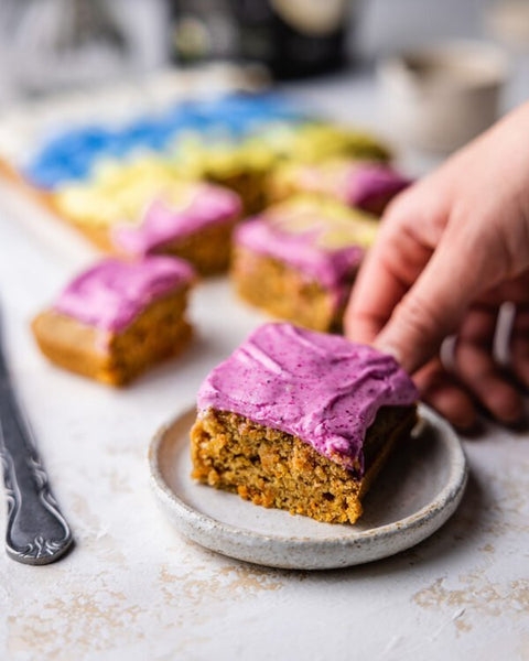 Carrot sheet cake with coloured cream cheese frosting