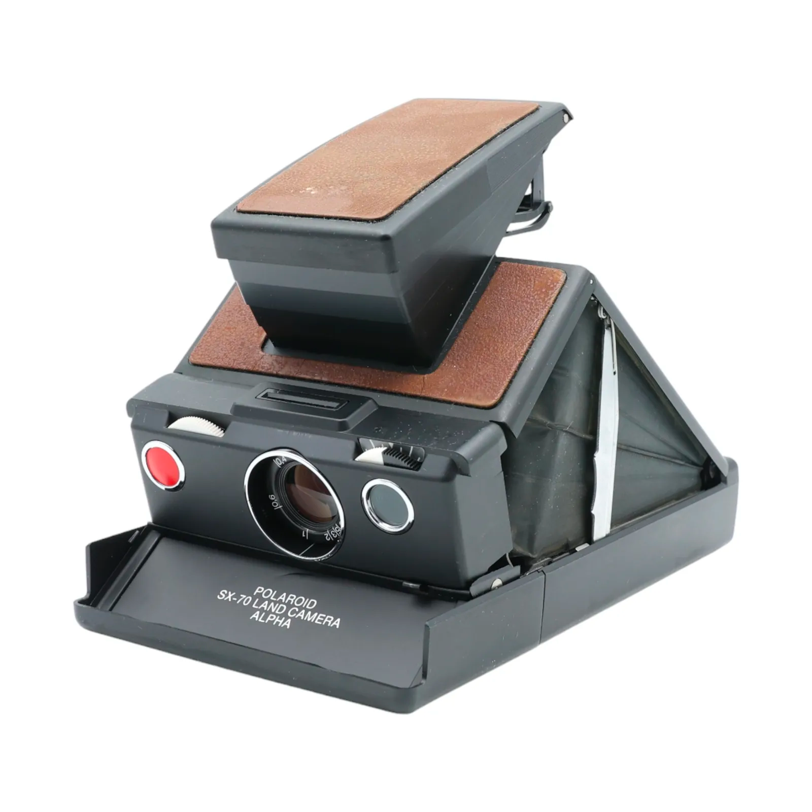 Polaroid SX-70 instant film camera, manufactured in the 70s, on a white plain backdrop