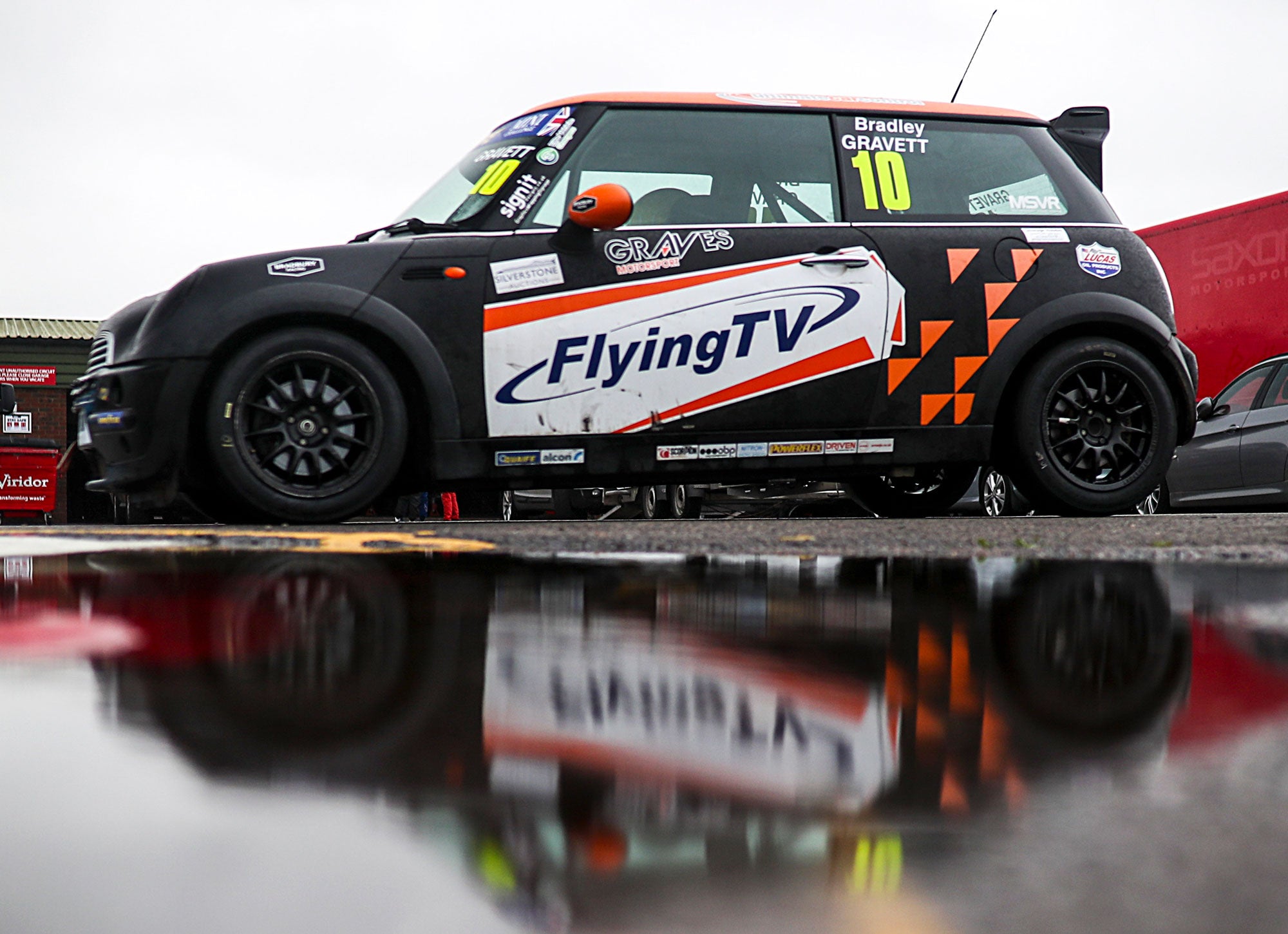 Bradley Gravett son of BTCC British Touring Car Champion Robb Gravett in the Cooper Trophy at Snetterton in 2020 with Water Reflection Graves Motorsport Mini Challenge JCW Cooper Racing Driver LIQUI MOLY LM Performance Thinking it Better