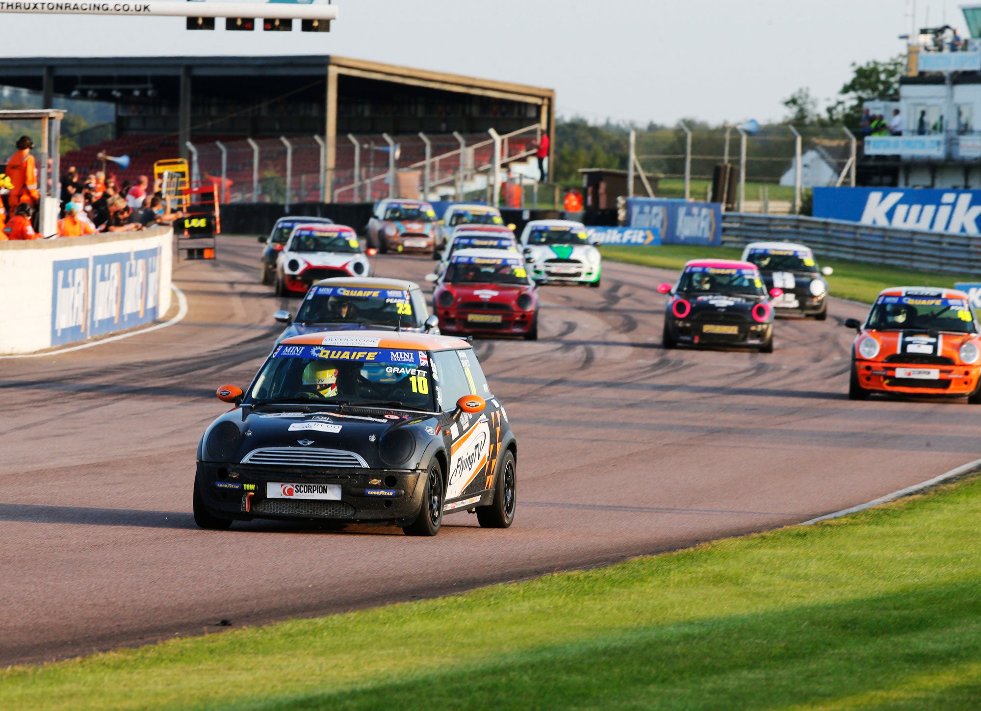 Bradley Gravett son of BTCC British Touring Car Champion Robb Gravett in the Cooper Trophy at Thruxton in 2020 on Main Straight with Graves Motorsport Mini Challenge JCW Cooper Racing Driver LIQUI MOLY LM Performance Omologato Watches