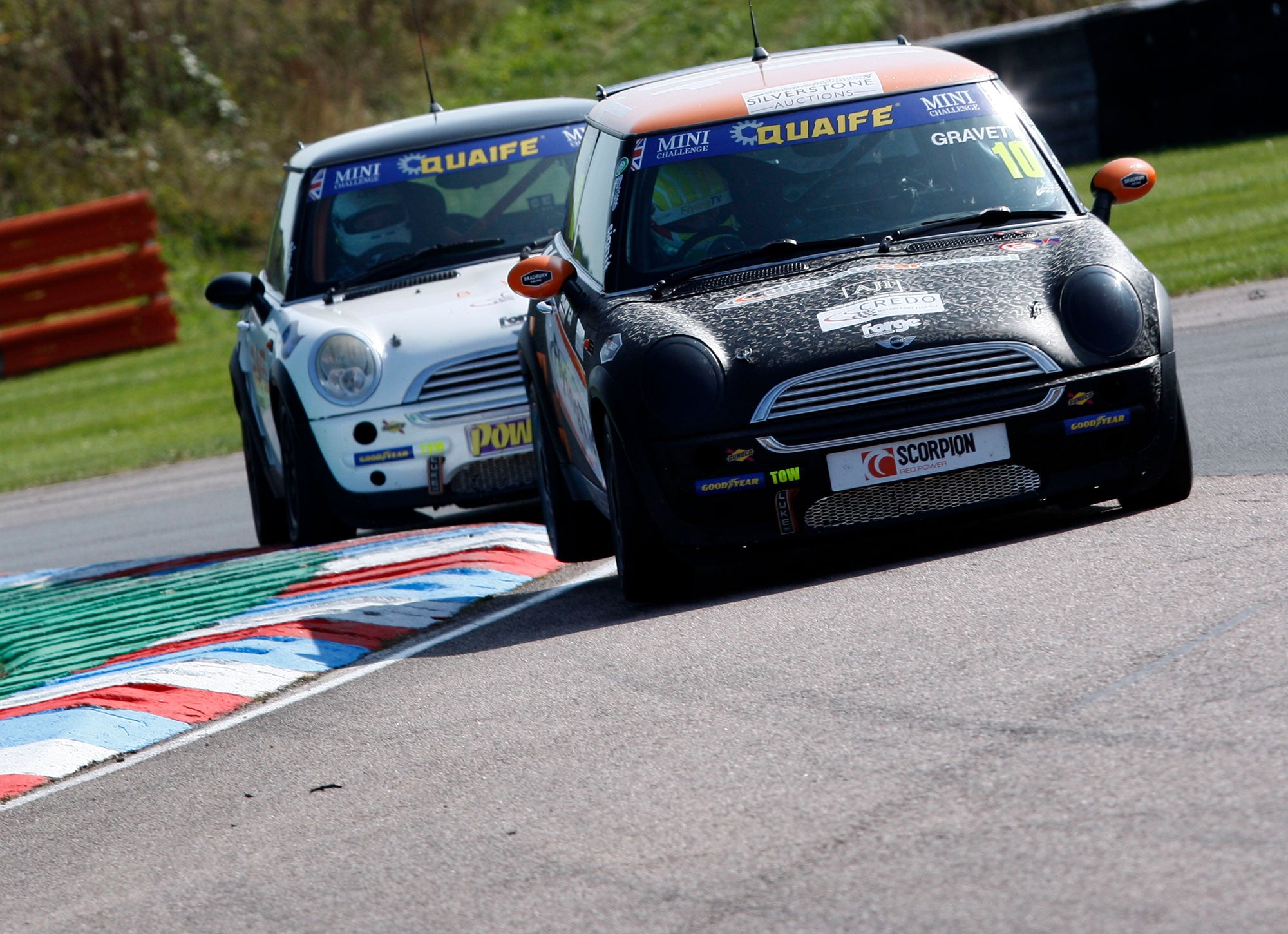 Bradley Gravett son of BTCC British Touring Car Champion Robb Gravett in the Cooper Trophy at Thruxton in 2020 with Alex Nevill  with Graves Motorsport Mini Challenge JCW Cooper Racing Driver LIQUI MOLY LM Performance Omologato Watches
