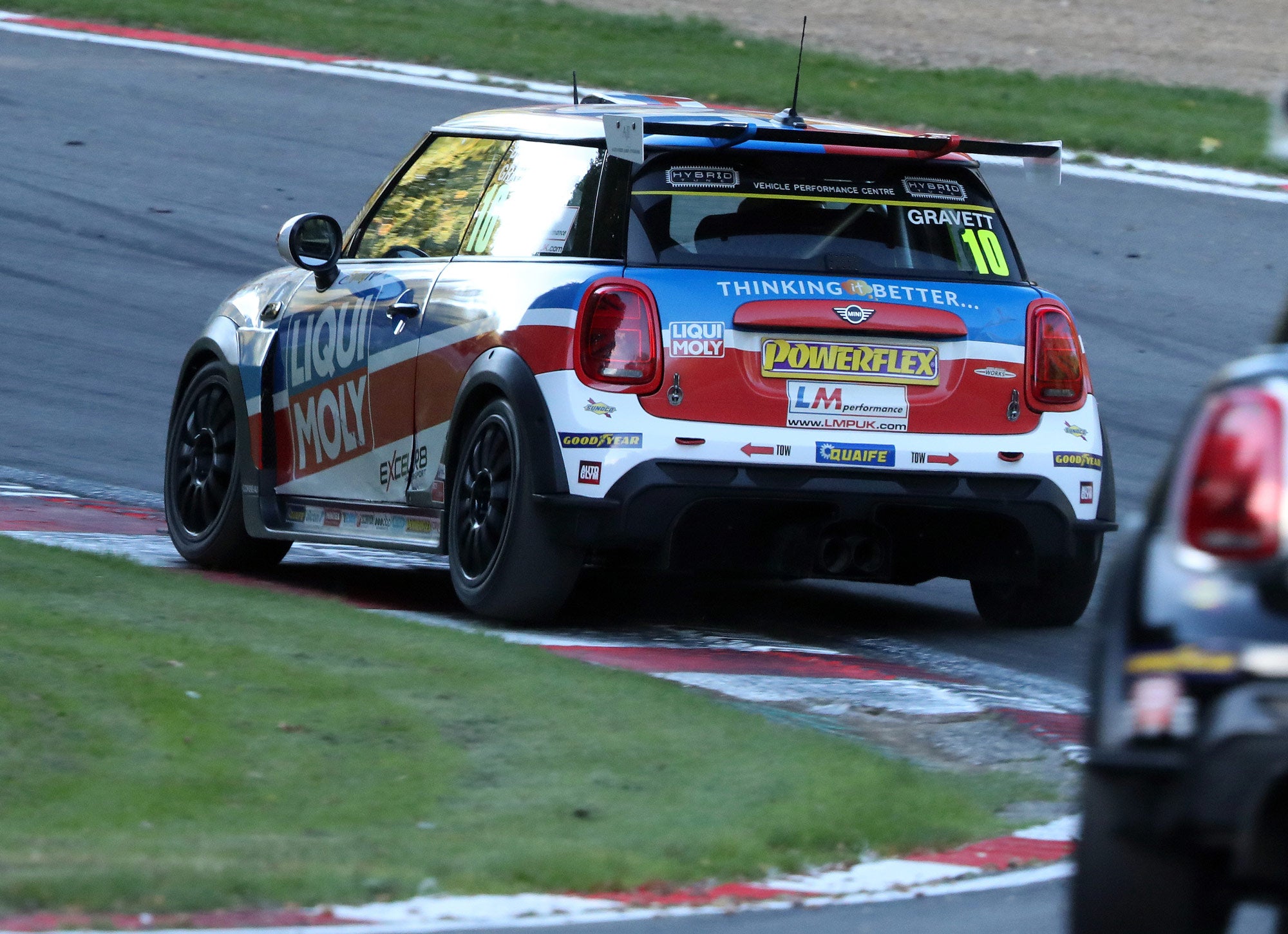 Bradley Gravett son of BTCC British Touring Car Champion Robb Gravett in the MINI Challenge JCW Series Driving at Brands Hatch GP at Stirlings on Curb EXCELR8 Motorsport LIQUI MOLY LM Performance Thinking it Better Scalextric DriverAssist.me