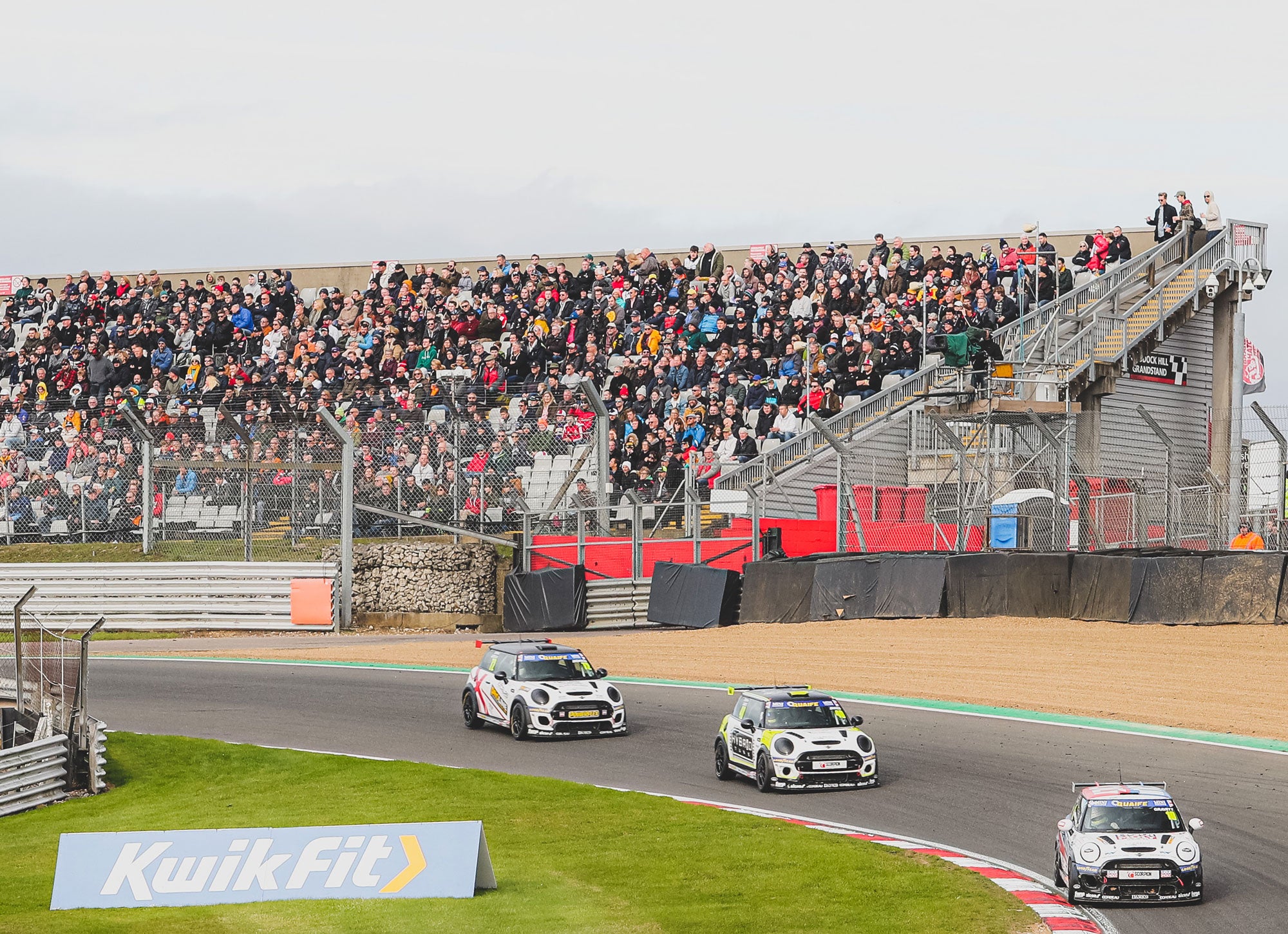 Bradley Gravett son of BTCC British Touring Car Champion Robb Gravett in the MINI Challenge JCW Series at Brands Hatch GP in 2021 with Big Crowds in Grandstand Graves Motorsport Cooper Racing Driver LIQUI MOLY LM Performance Thinking it Better