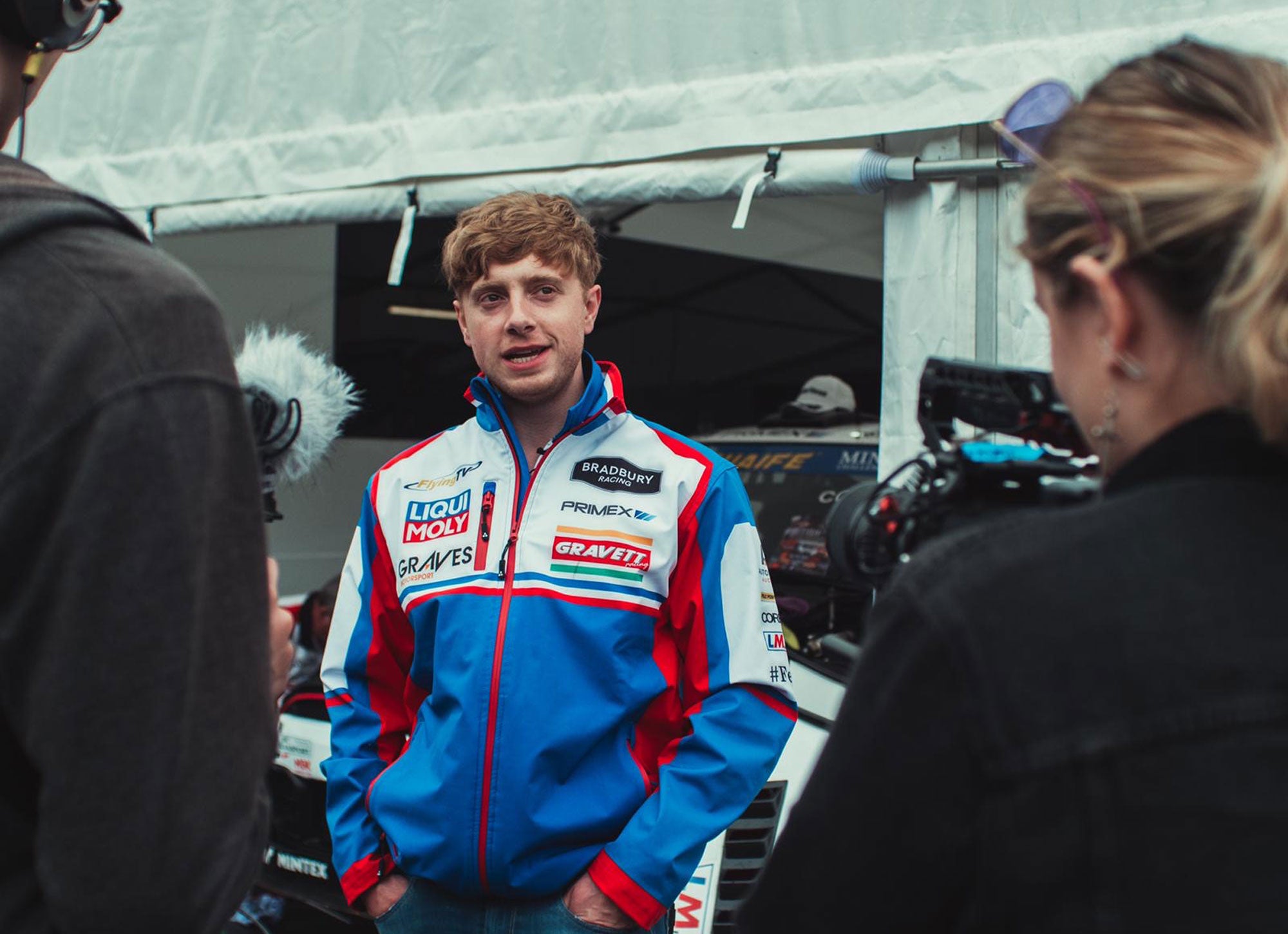 Bradley Gravett son of BTCC British Touring Car Champion Robb Gravett in the MINI Challenge JCW Series at Brands Hatch Indy in 2022 Bradley Being Interviewed by PolyChrome Studios Graves Motorsport Cooper Racing Driver LIQUI MOLY LM Performance