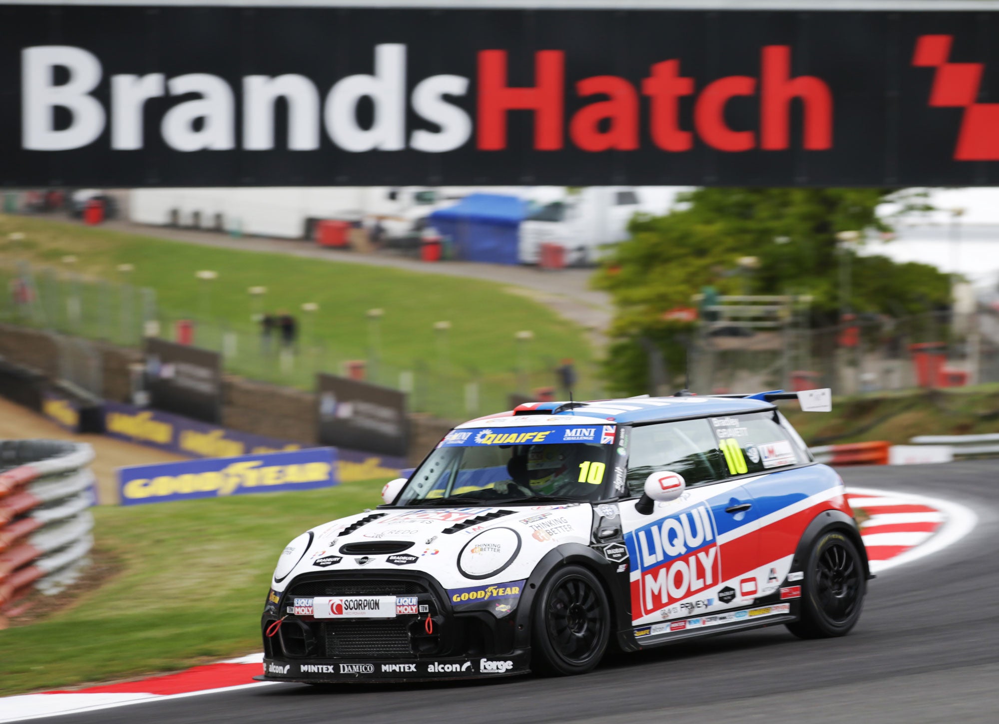 Bradley Gravett son of BTCC British Touring Car Champion Robb Gravett in the MINI Challenge JCW Series at Brands Hatch Indy in 2022 Turning into Druids Graves Motorsport Cooper Racing Driver LIQUI MOLY LM Performance Thinking it Better