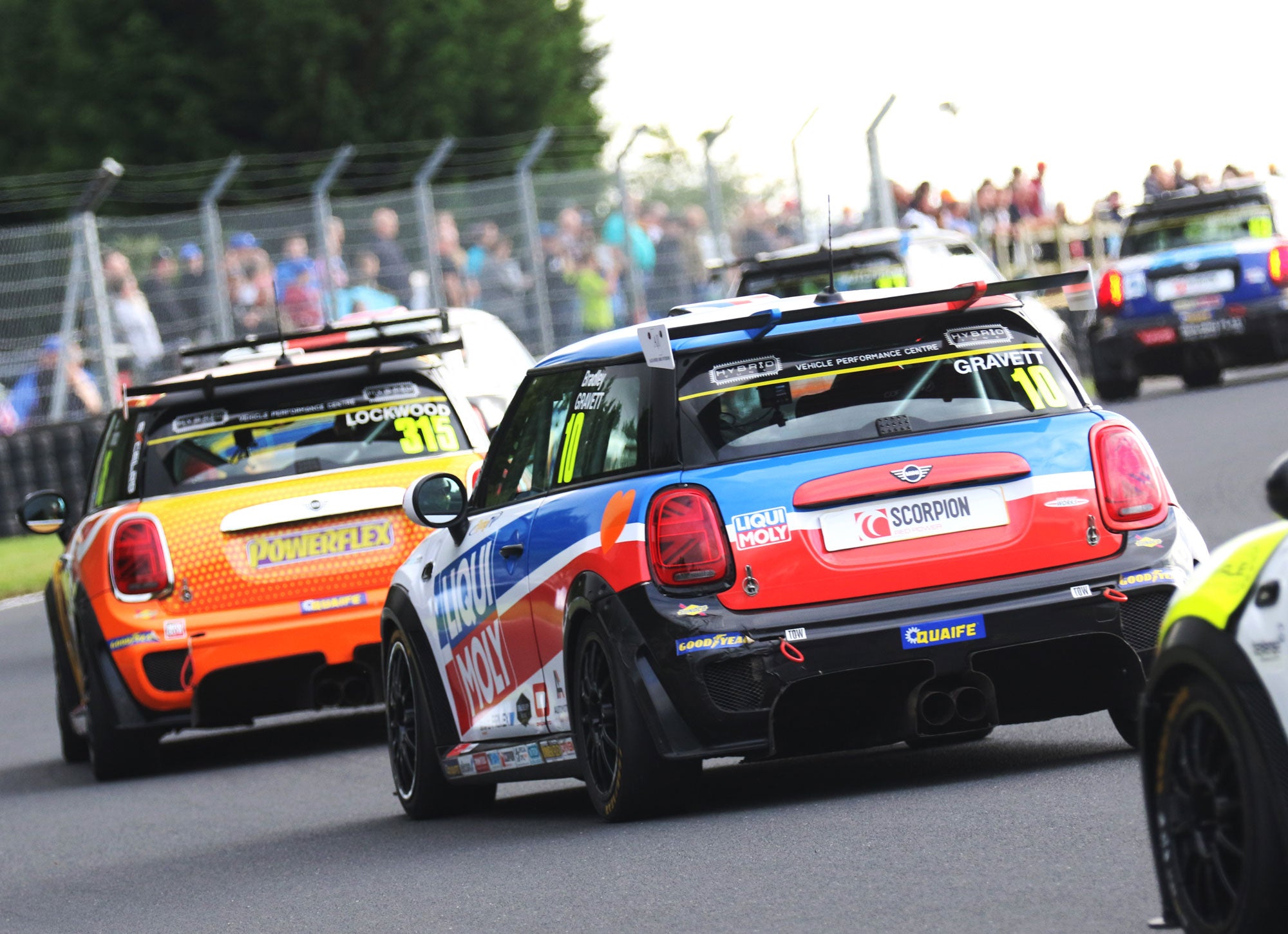 Bradley Gravett son of BTCC British Touring Car Champion Robb Gravett in the MINI Challenge JCW Series at Croft in 2021 Through Turn 3 with Big Crowds Graves Motorsport Cooper Racing Driver LIQUI MOLY LM Performance Thinking it Better