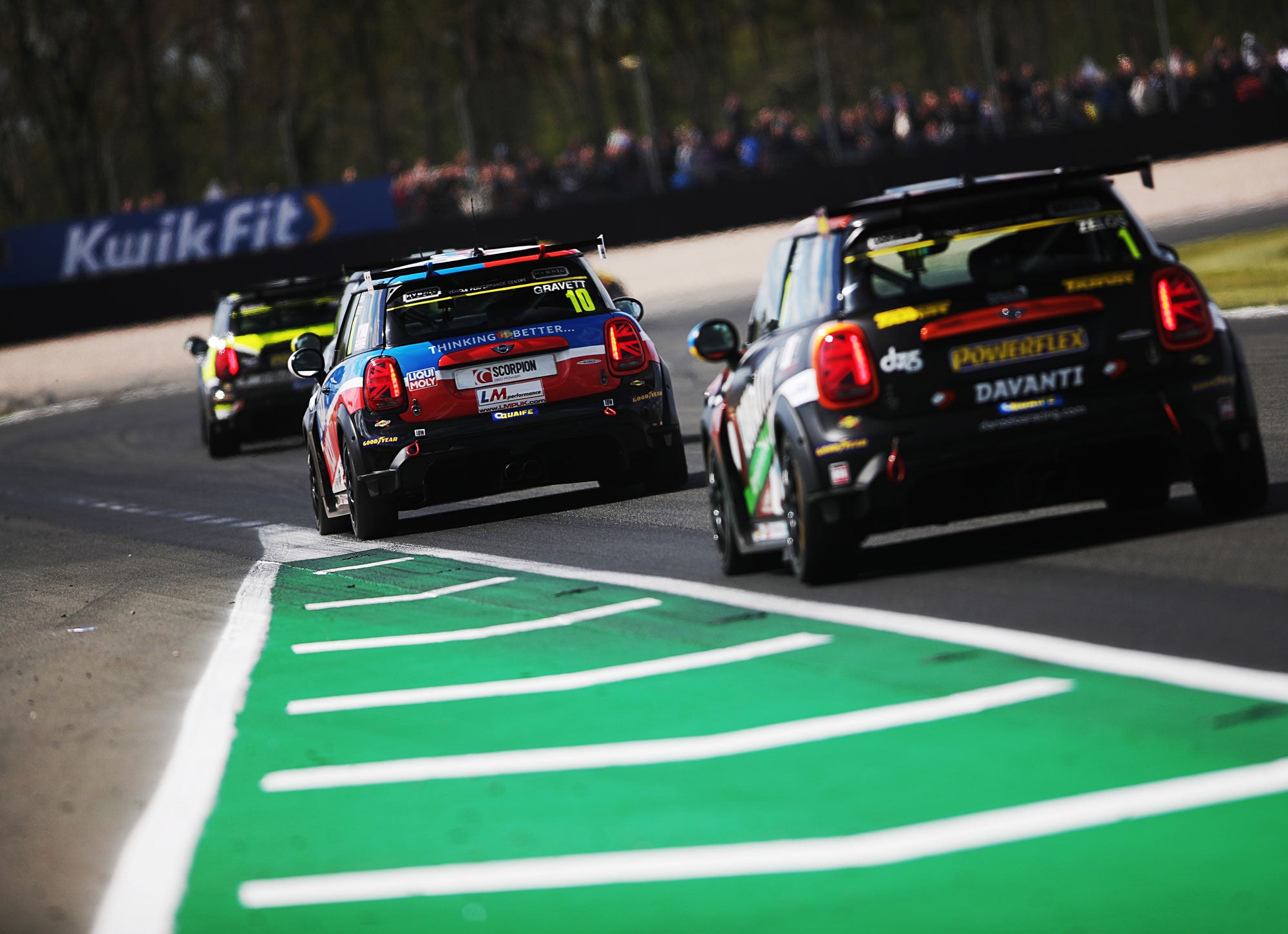 Bradley Gravett son of BTCC British Touring Car Champion Robb Gravett in the MINI Challenge JCW Series at Donington in 2022 Entry of Redgate with Dan Zelos Behind Graves Motorsport Cooper Racing Driver LIQUI MOLY LM Performance Thinking it Better