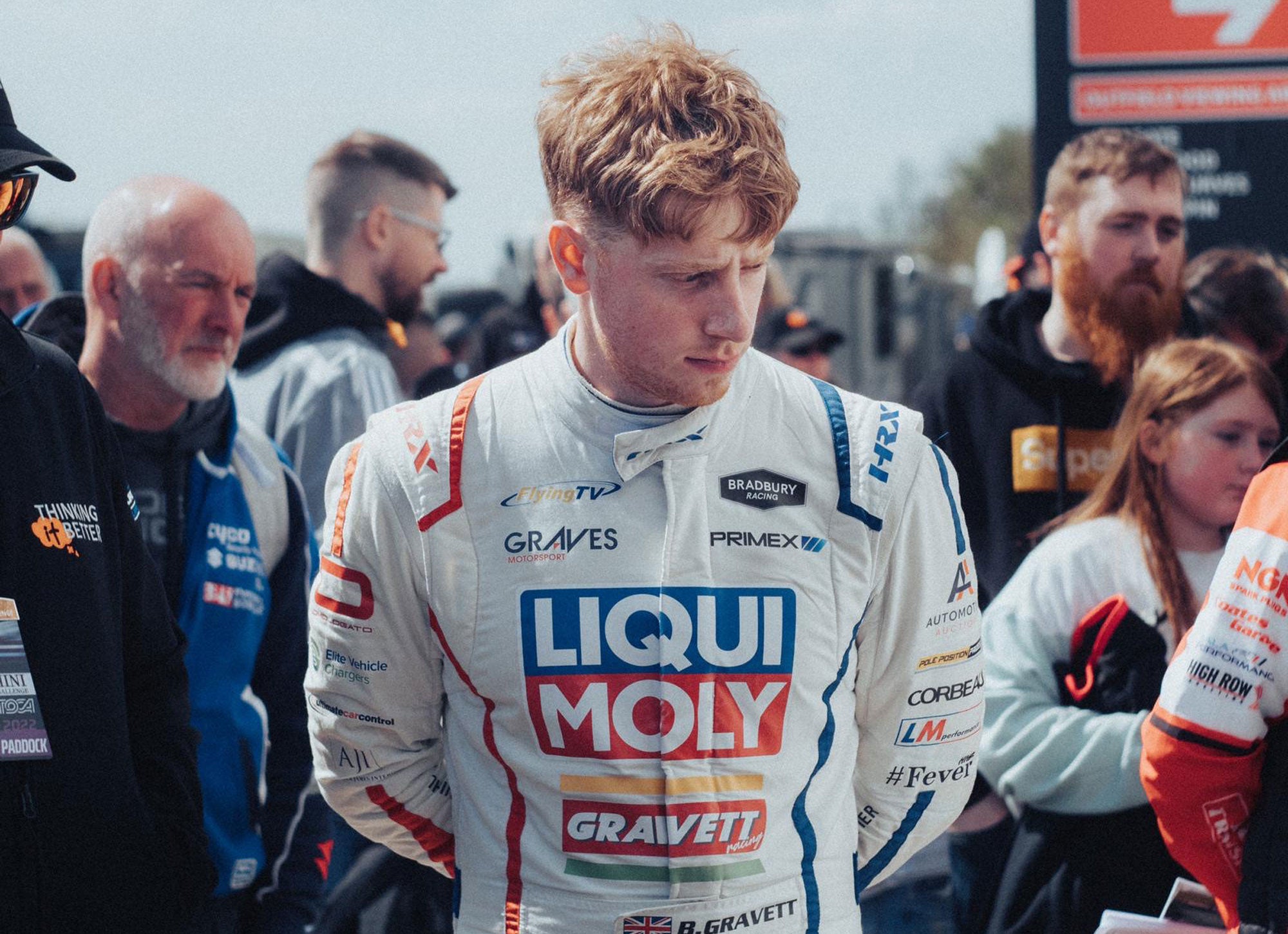Bradley Gravett son of BTCC British Touring Car Champion Robb Gravett in the MINI Challenge JCW Series at Donington in 2022 Just About to Get into Race Car Graves Motorsport Cooper Racing Driver LIQUI MOLY LM Performance Thinking it Better