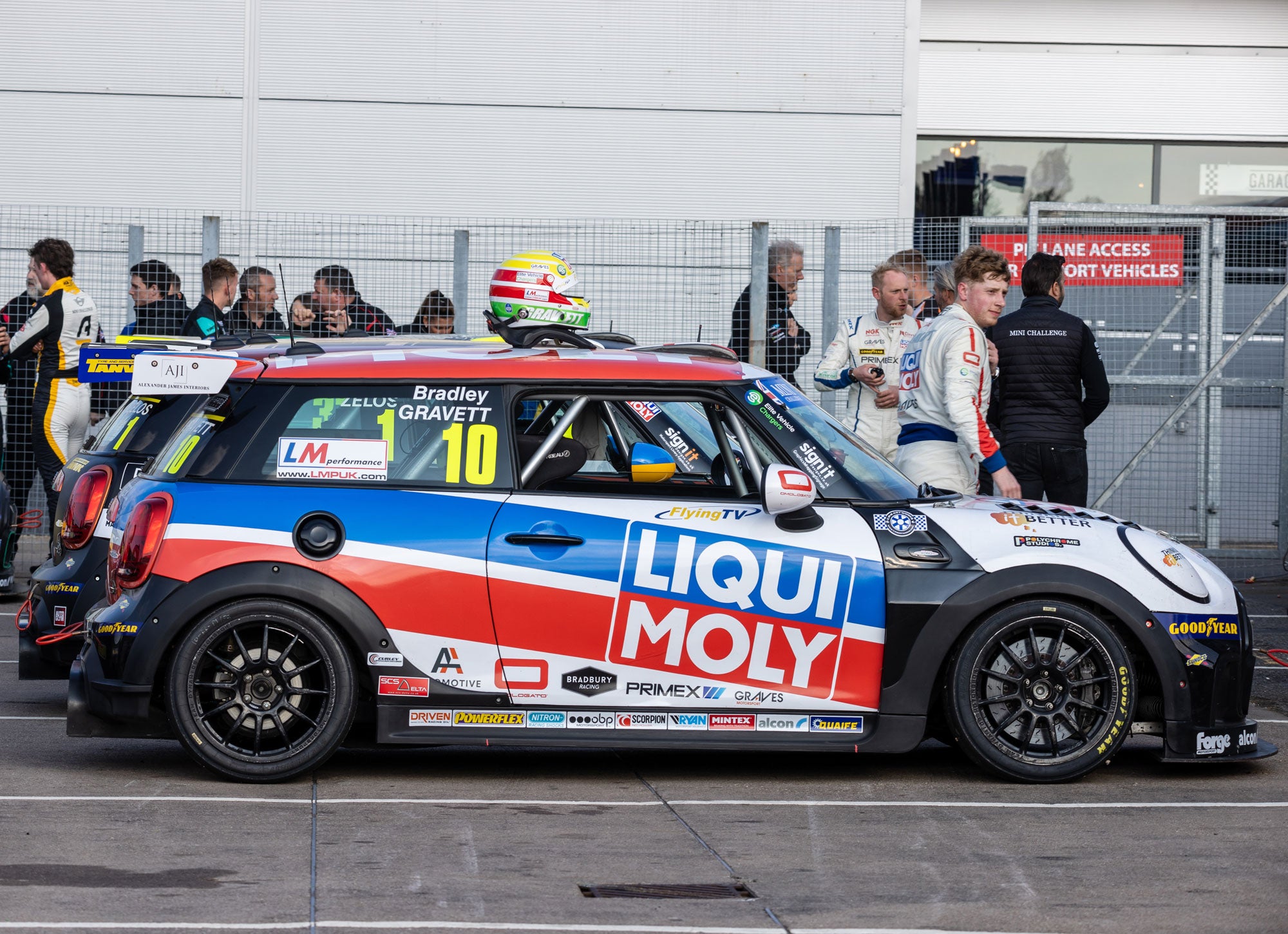 Bradley Gravett son of BTCC British Touring Car Champion Robb Gravett in the MINI Challenge JCW Series at Donington in 2022 Race Car in Parc Ferme after race 3 Graves Motorsport Cooper Racing Driver LIQUI MOLY LM Performance Thinking it Better