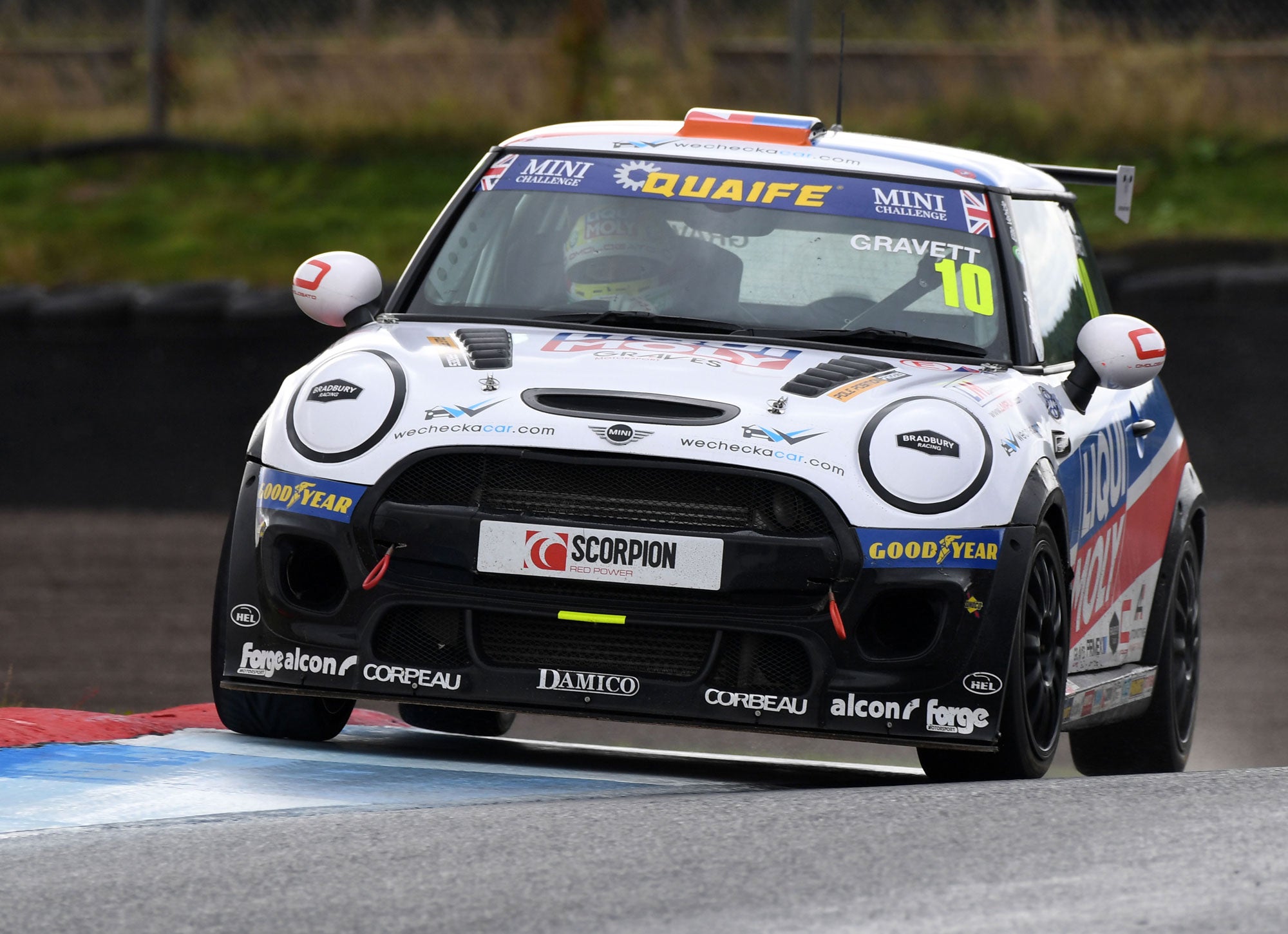 Bradley Gravett son of BTCC British Touring Car Champion Robb Gravett in the MINI Challenge JCW Series at Knockhill in 2021 Turn 6 on the Curb Graves Motorsport Cooper Racing Driver LIQUI MOLY LM Performance Thinking it Better