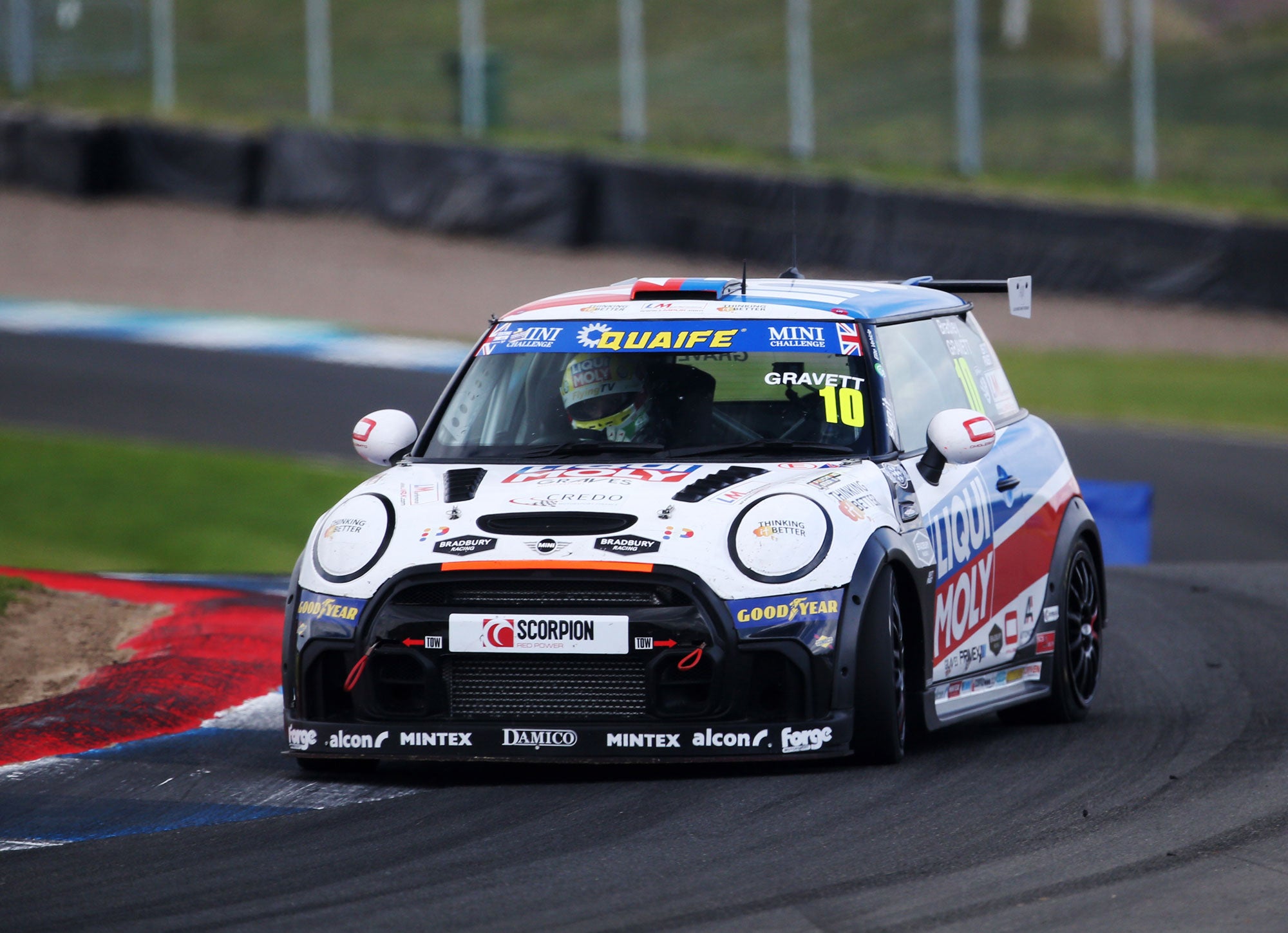 Bradley Gravett son of BTCC British Touring Car Champion Robb Gravett in the MINI Challenge JCW Series at Knockhill in 2022 Oversteering Through Chicane Graves Motorsport Cooper Racing Driver LIQUI MOLY LM Performance Thinking it Better