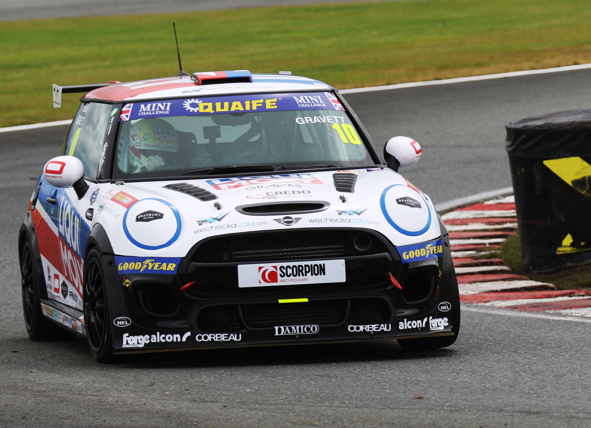 Bradley Gravett son of BTCC British Touring Car Champion Robb Gravett in the MINI Challenge JCW Series at Oulton Park in 2021 mid Chicane Graves Motorsport Cooper Racing Driver LIQUI MOLY LM Performance Thinking it Better