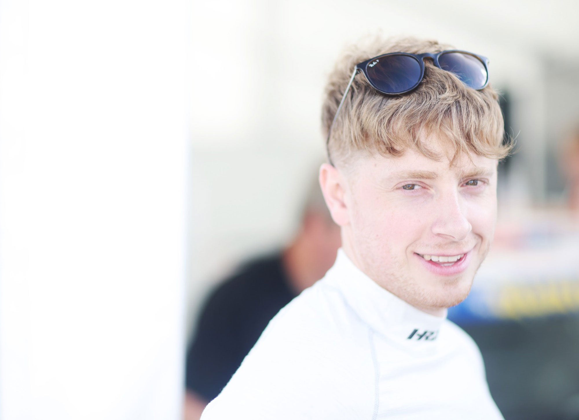 Bradley Gravett son of BTCC British Touring Car Champion Robb Gravett in the MINI Challenge JCW Series at Oulton Park in 2022 Bradley Smiling with Ray Bans Graves Motorsport Cooper Racing Driver LIQUI MOLY LM Performance Thinking it Better