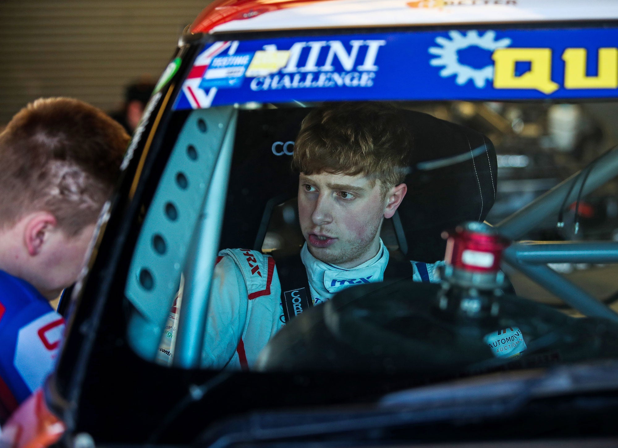 Bradley Gravett son of BTCC British Touring Car Champion Robb Gravett in the MINI Challenge JCW Series at Silverstone National Tyre Test in 2022 Sat in Race Car Graves Motorsport Cooper Racing Driver LIQUI MOLY LM Performance Thinking it Better