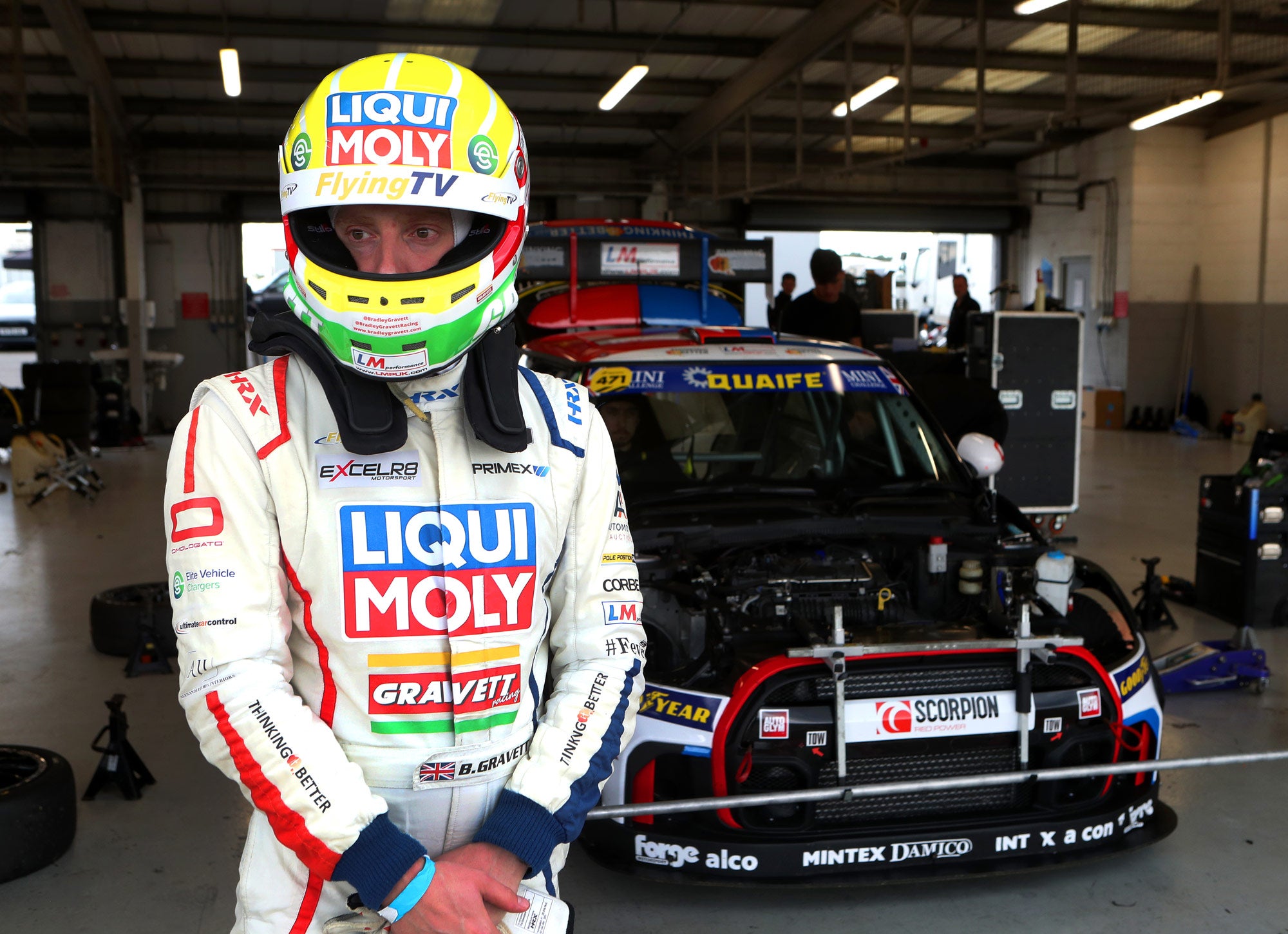 Bradley Gravett son of BTCC British Touring Car Champion Robb Gravett in the MINI Challenge JCW Series at Silverstone with EXCELR8 Motorsport Brad standing in front of car Cooper Racing Driver LIQUI MOLY LM Performance Thinking it Better