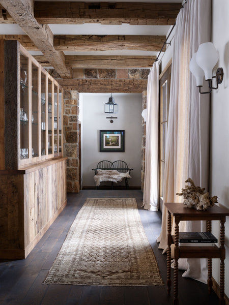 hallway with vintage rug