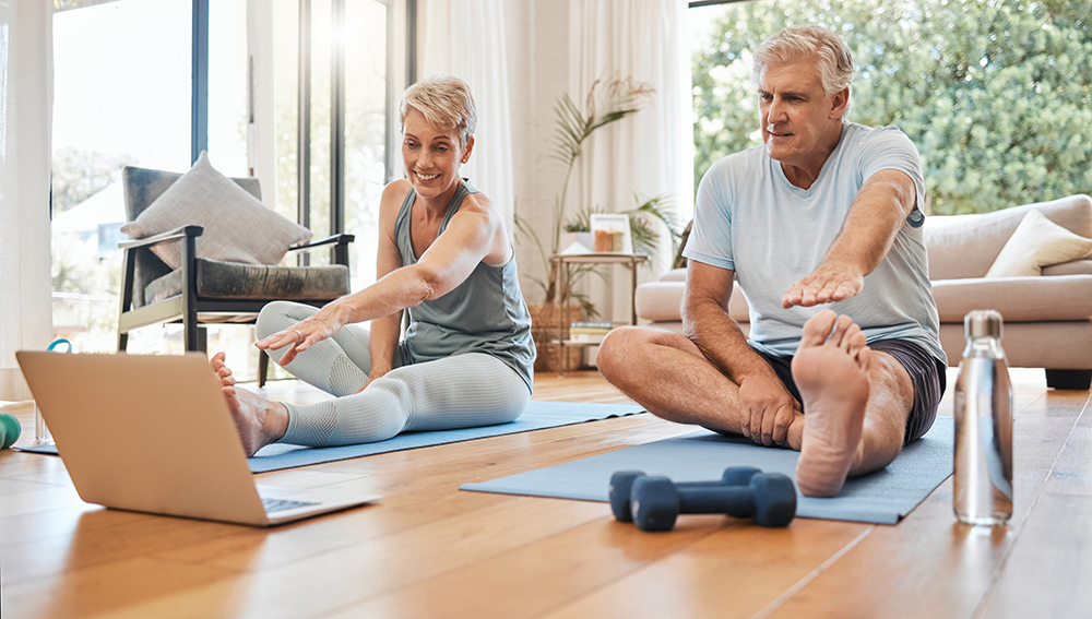 image that senior couple are stretching