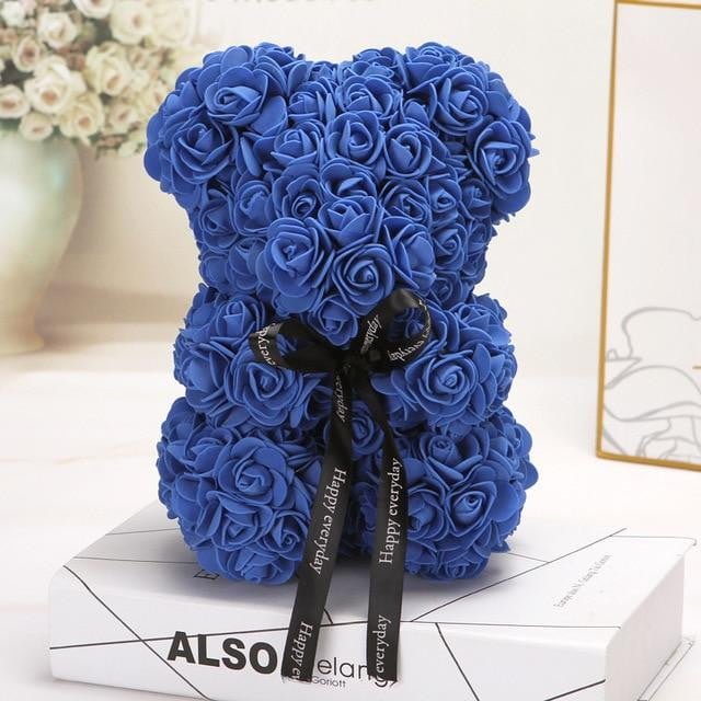 teddy bear with blue roses