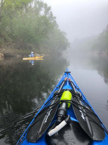 Kayakers on the Suwanee River in the fog