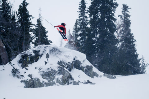 Photo by: Augie Schield of Ben Goertzen taking a jump while skiing Bridger Bowl, in Bozeman, Montana