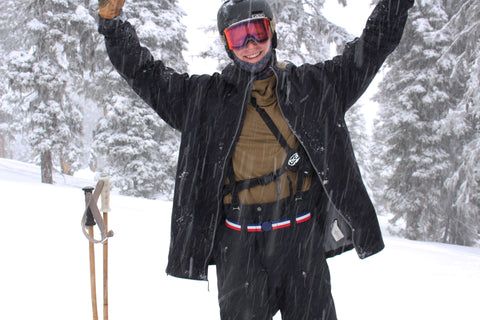 Ben Goertzen taking a ski break, while wearing Jelt's USA belt