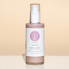 Bottle of Wash Cream Cleanser on a simple background