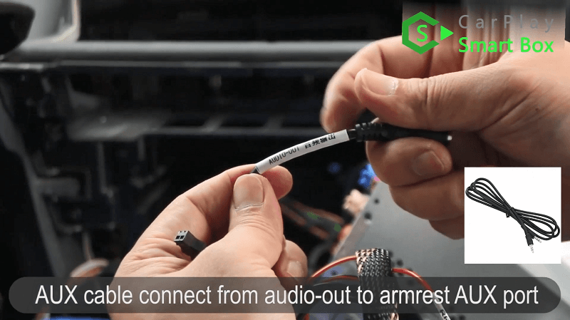 12.AUX cable connection from audio-out to armrest AUX port.