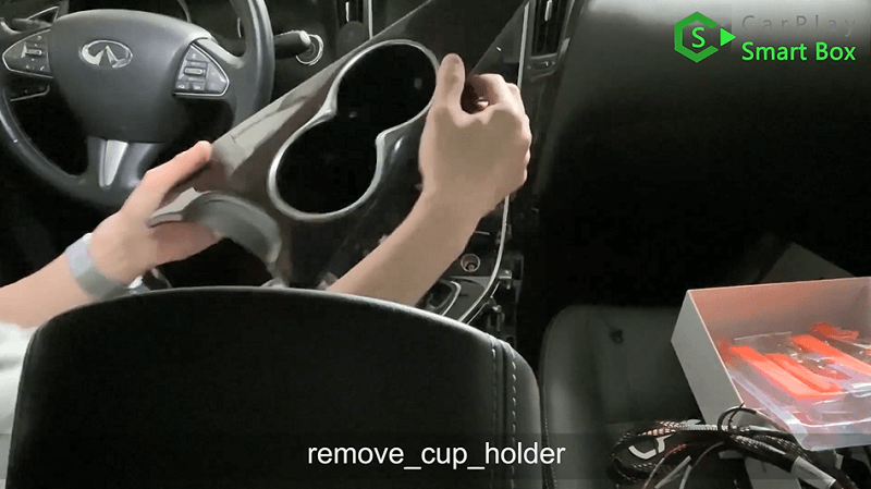 3.Remove cup holder.