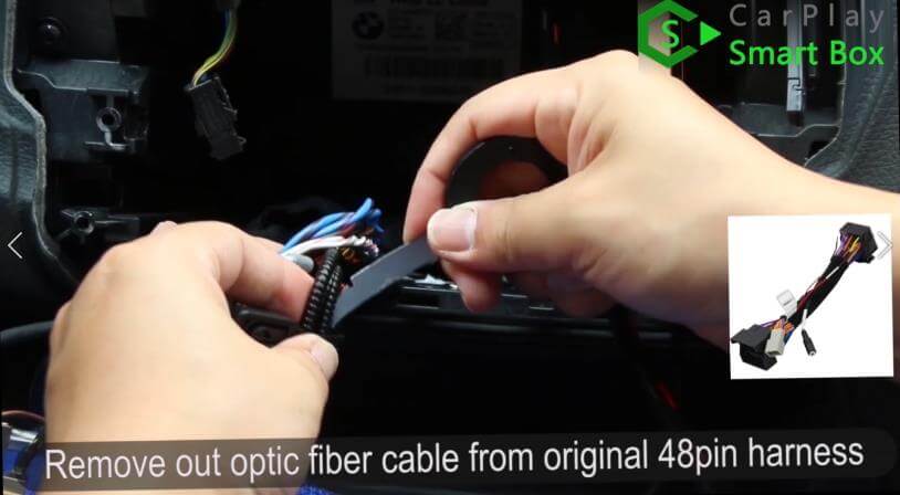 3. Remove out optic fiber cable from original 48PIN harness - How to install WiFi Wireless Apple CarPlay on BMW F30 NBT EVO Head Unit - CarPlay Smart Box