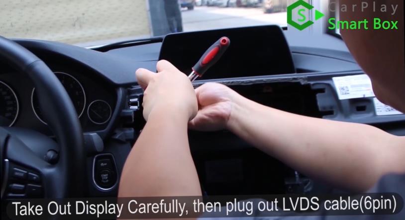 6. Take out display carefully, then plug out LVDS cable (6PIN) - How to install WiFi Wireless Apple CarPlay on BMW F30 NBT EVO Head Unit - CarPlay Smart Box