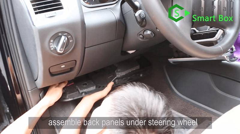 8.Assemble back panels under steering wheel.