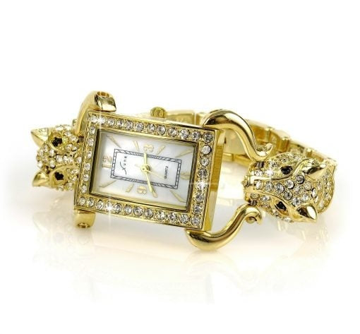 Montre bracelet des années 1900, cadran rectangle, serti de diamants surmonté de tête d'animaux de chaque côté