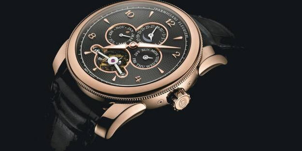 Montre-bracelet, cuir noir, de Parmigiani Fleurier  Toric Tecnica remontage manuel et 3 complications : un calendrier perpétuel, un tourbillon et une répétition minutes.