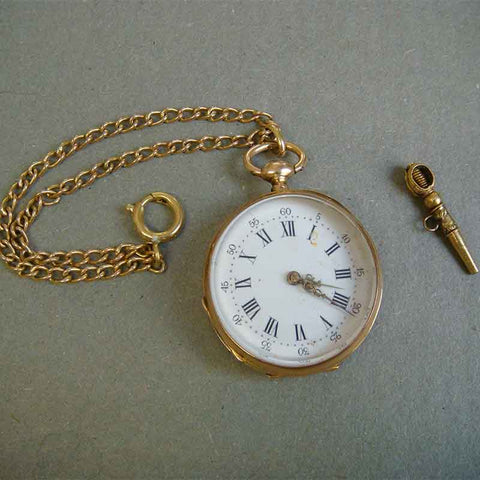 montre à gousset ancienne en or avec clé de remontage
