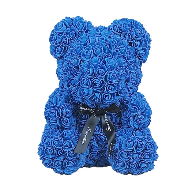 teddy bear with blue roses