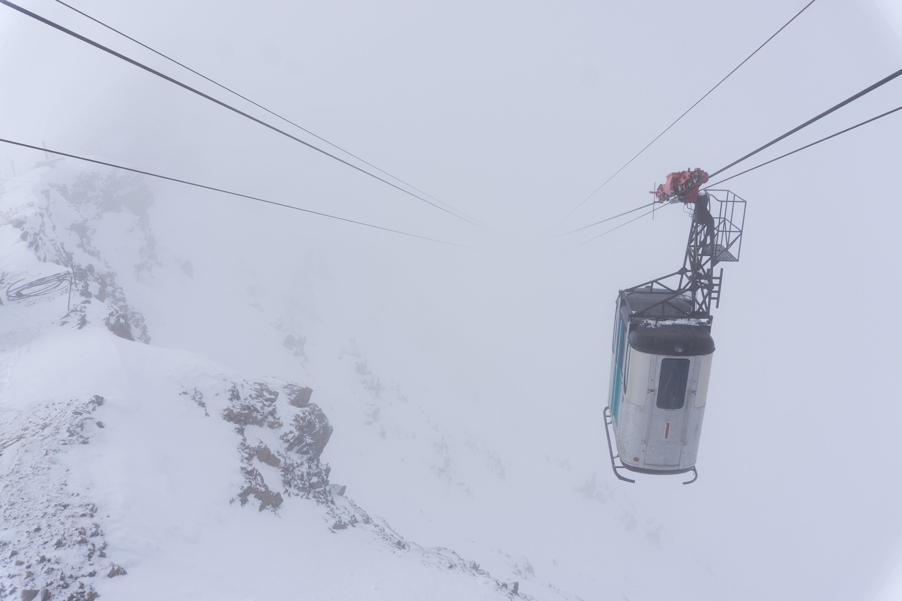 Small skier tram in clouds