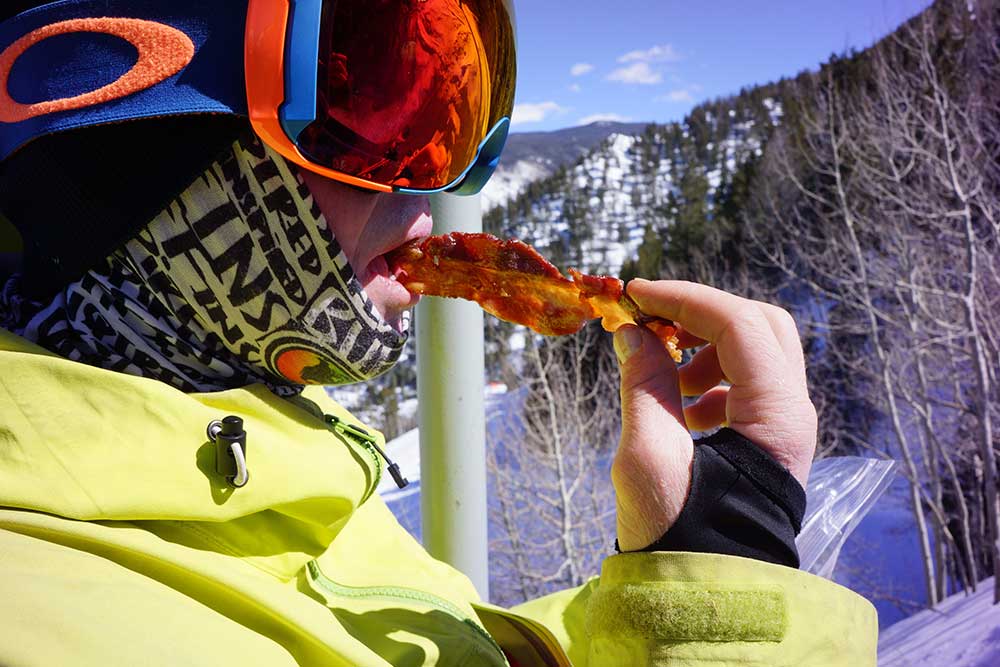 eating bacon on chairlift
