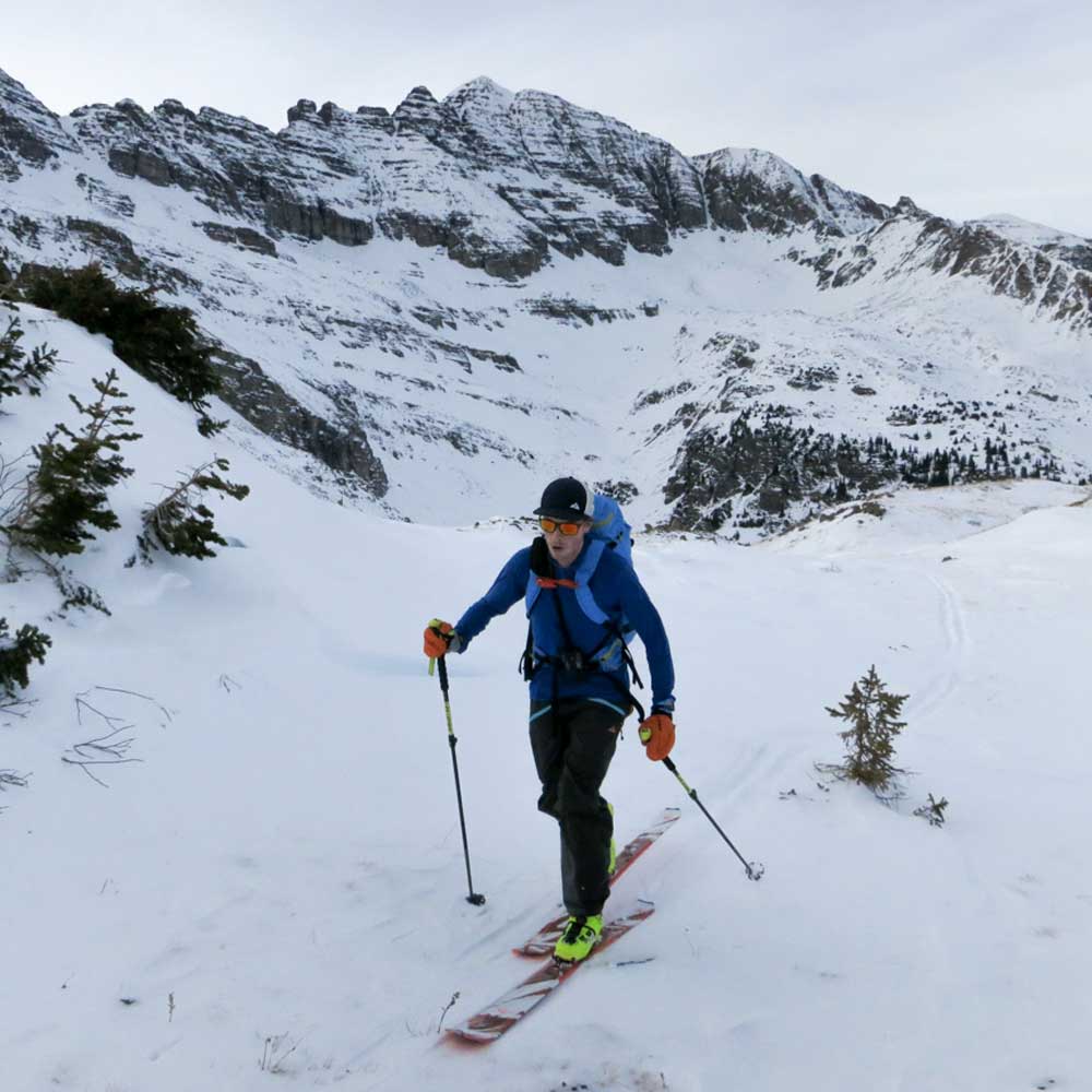 ski tourer in front of Castle Peak