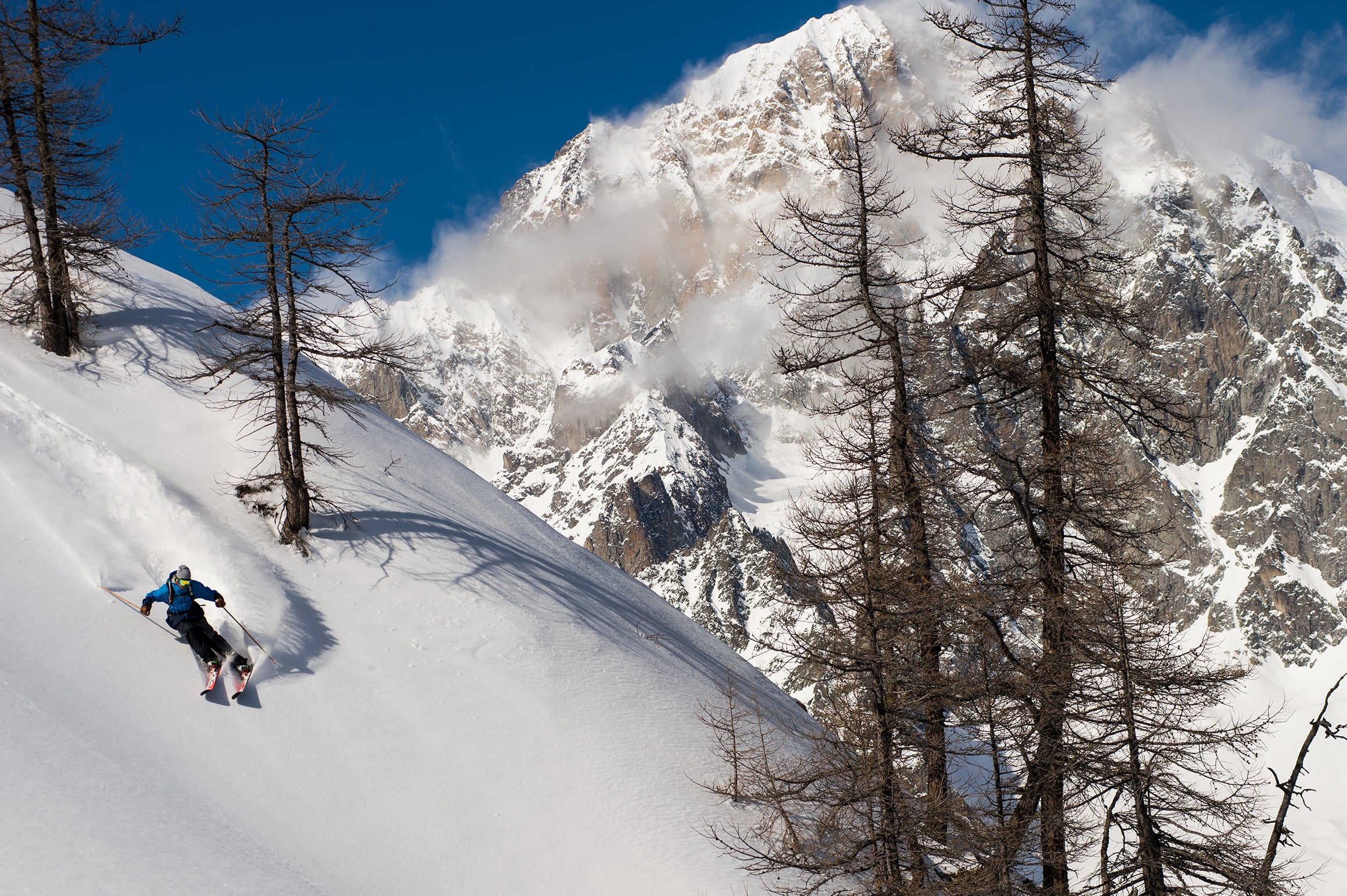 Skier powder turn in Italy