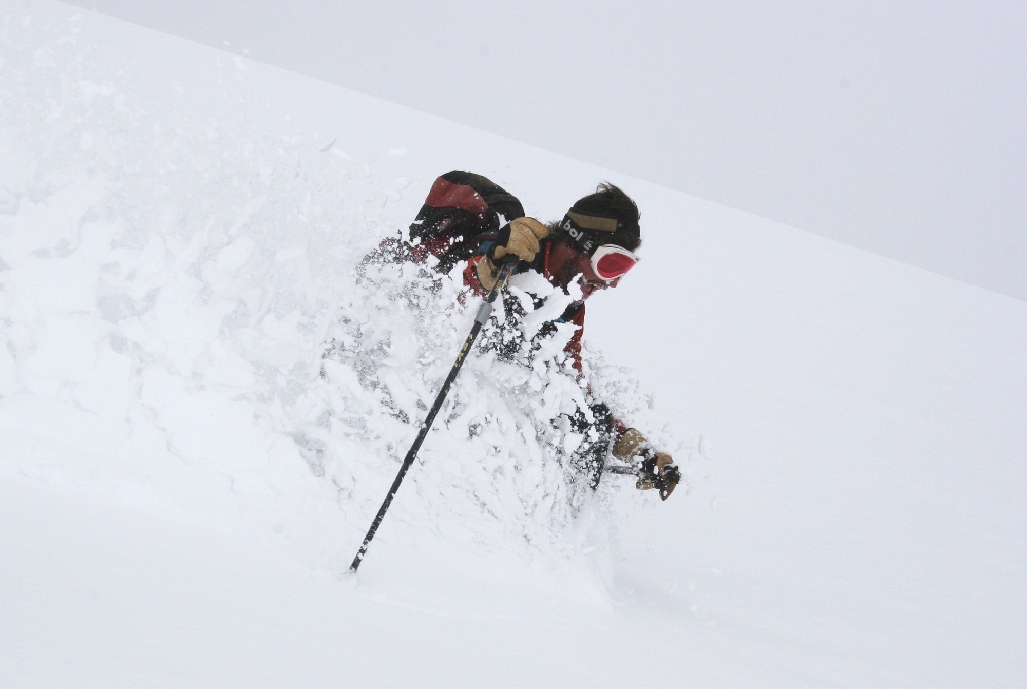 Skier in highlands bowl powder