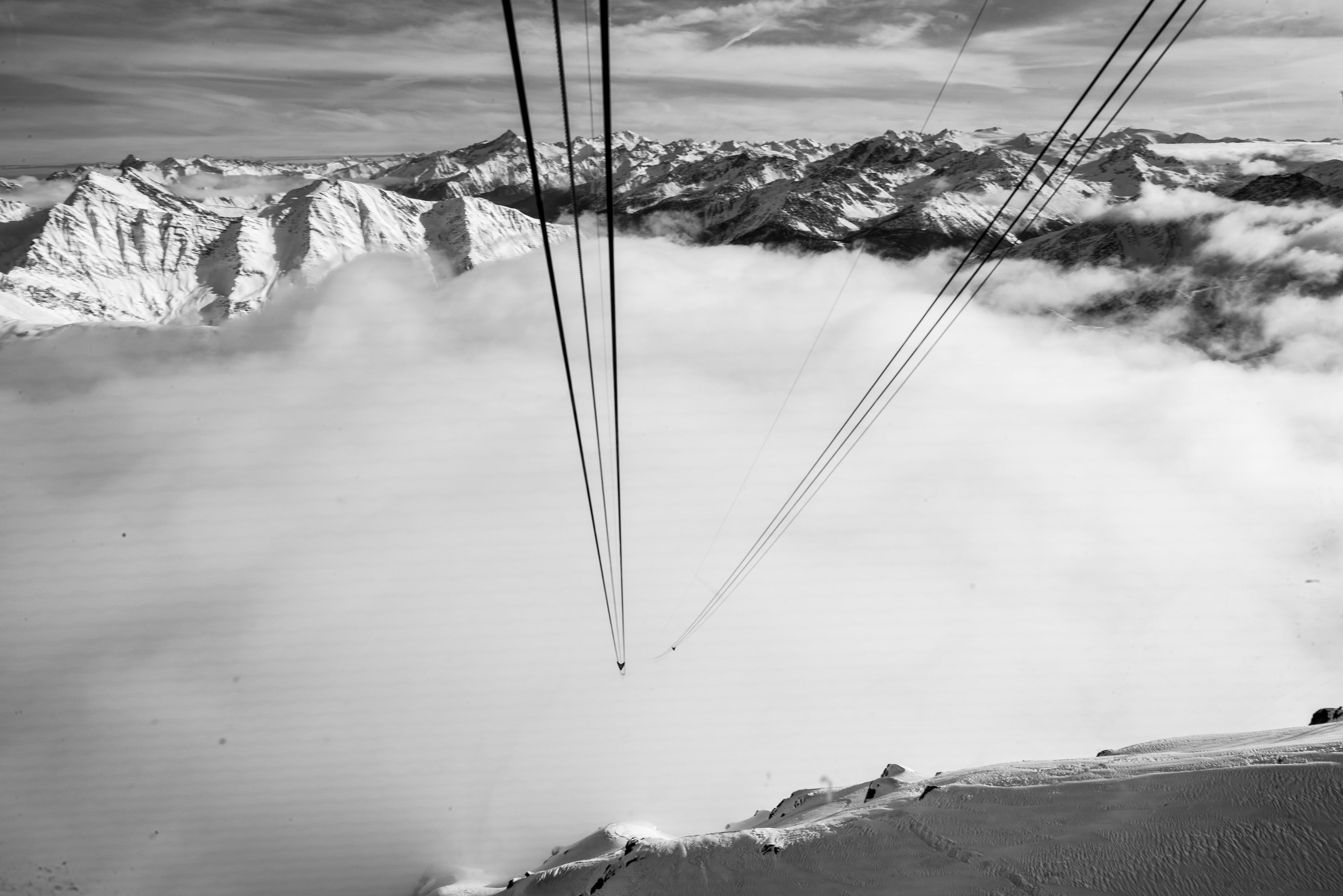 Tram cables dissappearing into clouds