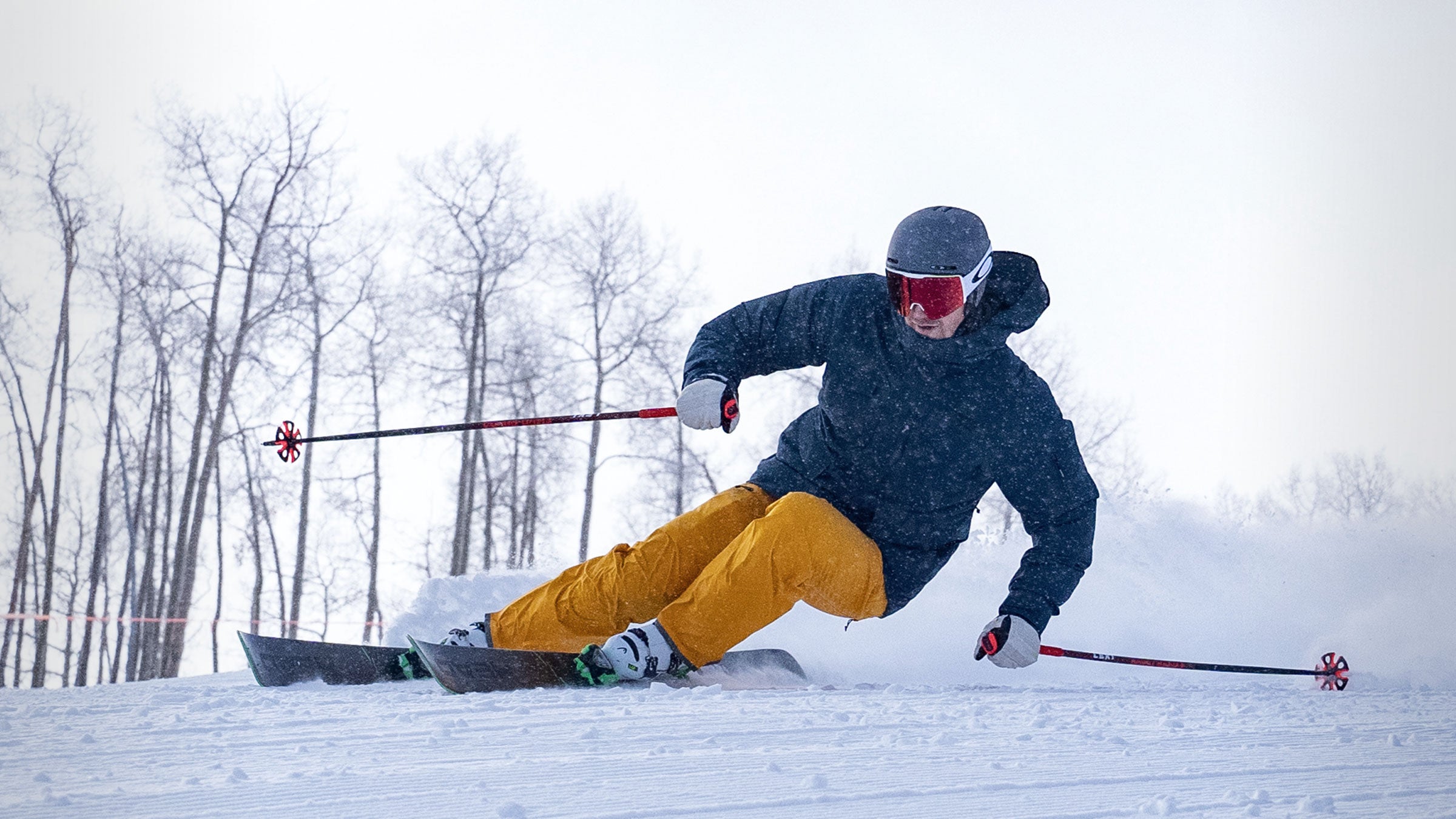 skier carving turn in turmeric capitol ski pant