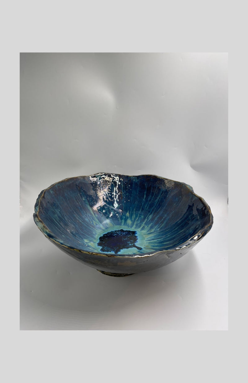 large glass bowl on pedestal