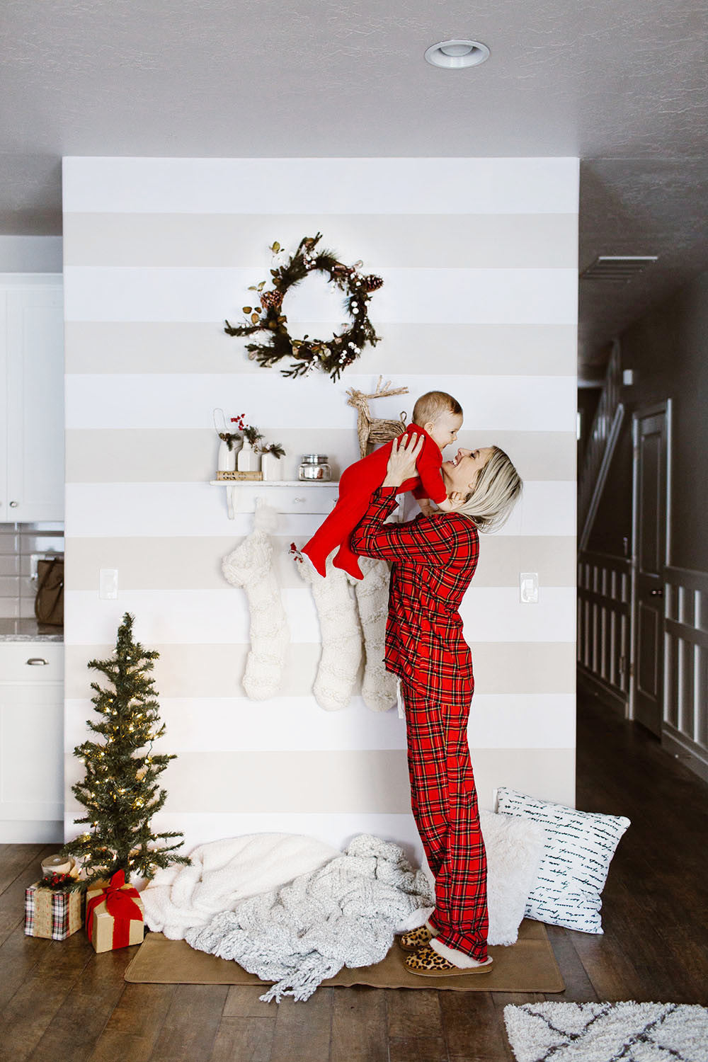 Holiday themed accent wall using Easy Stripe from WallsNeedLove