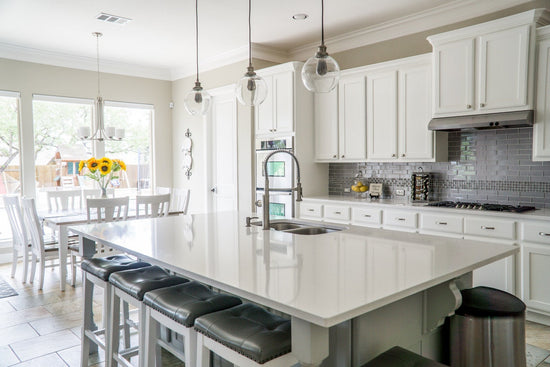 a marble kitchen and dinning area 