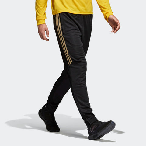 gold and black adidas pants